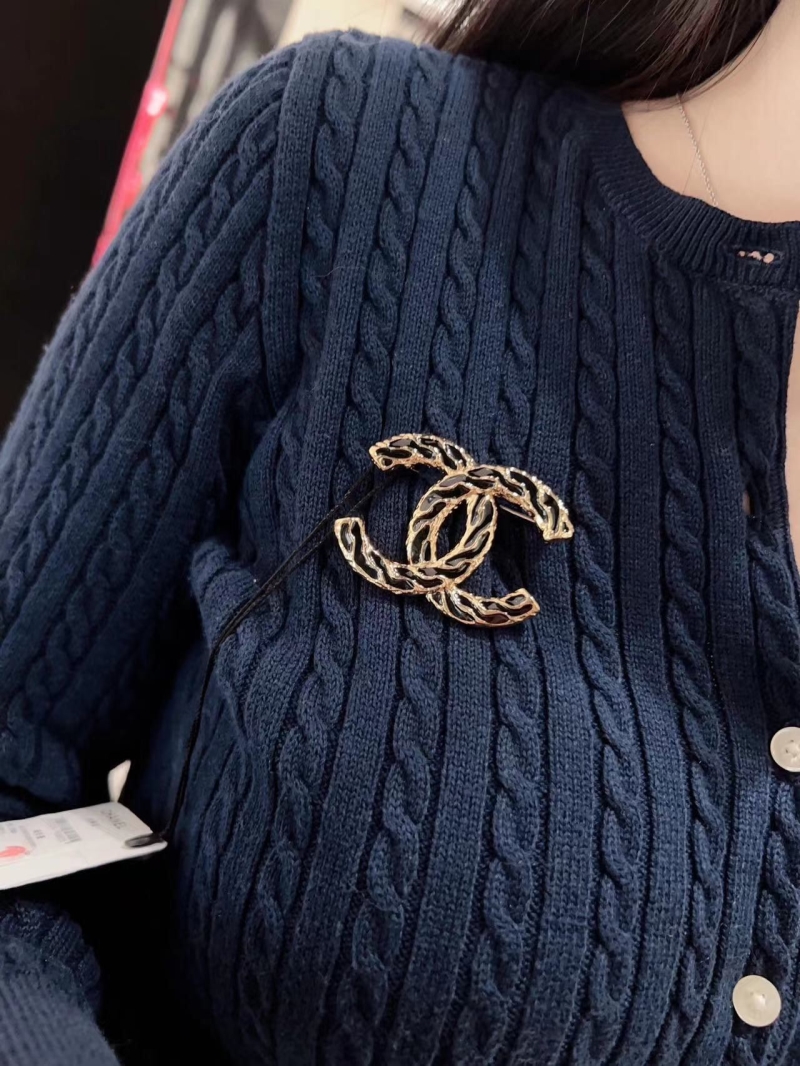 Ch**el brooches